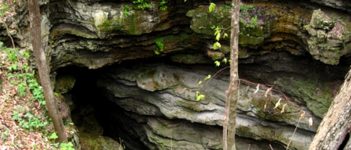 Photo of hidden cave entrance between rock