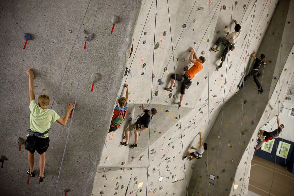 People on an indoor climbing wall