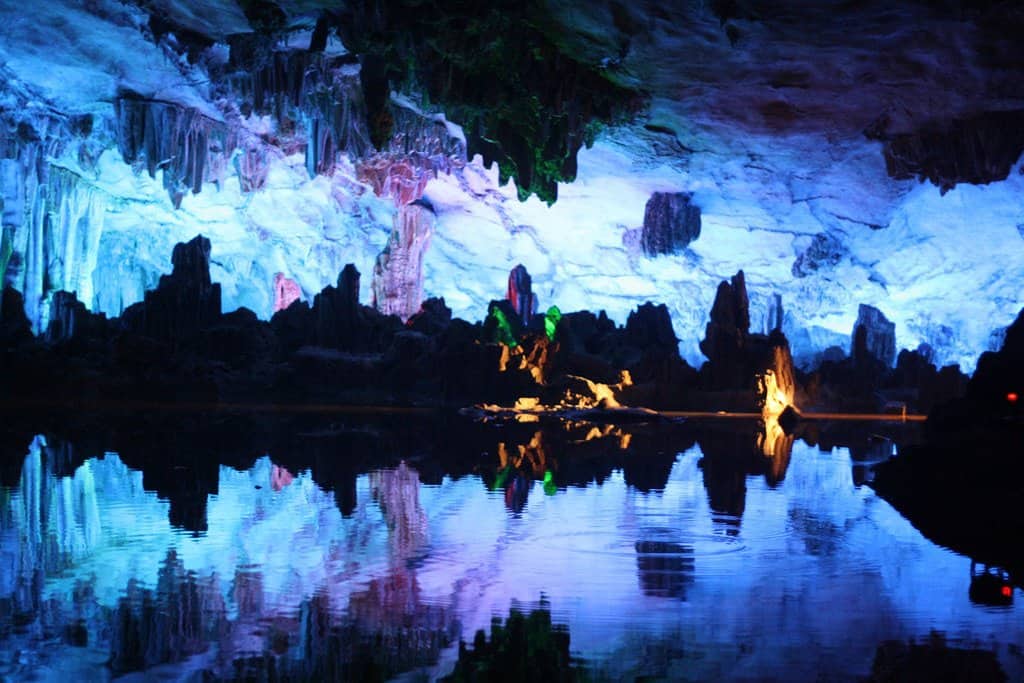 Blue and purple lighting in large cave